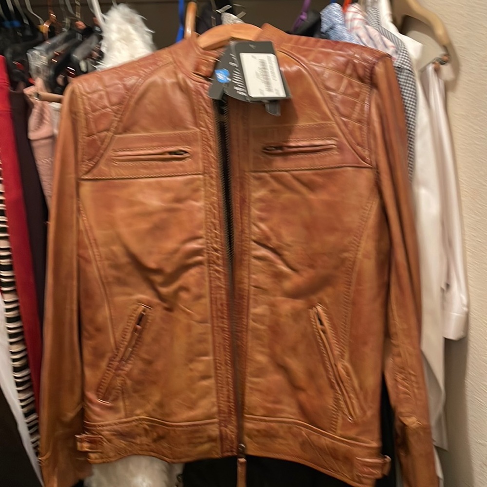 Brown leather coat real bought it from Amazon 179